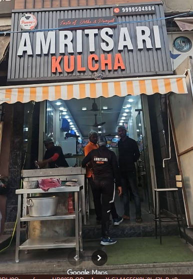 Pummy's Amritsari Kulcha Restaurant exterior with traditional ambiance